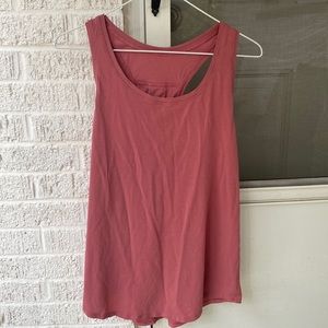 Lululemon pink racerback tank top fits like size large